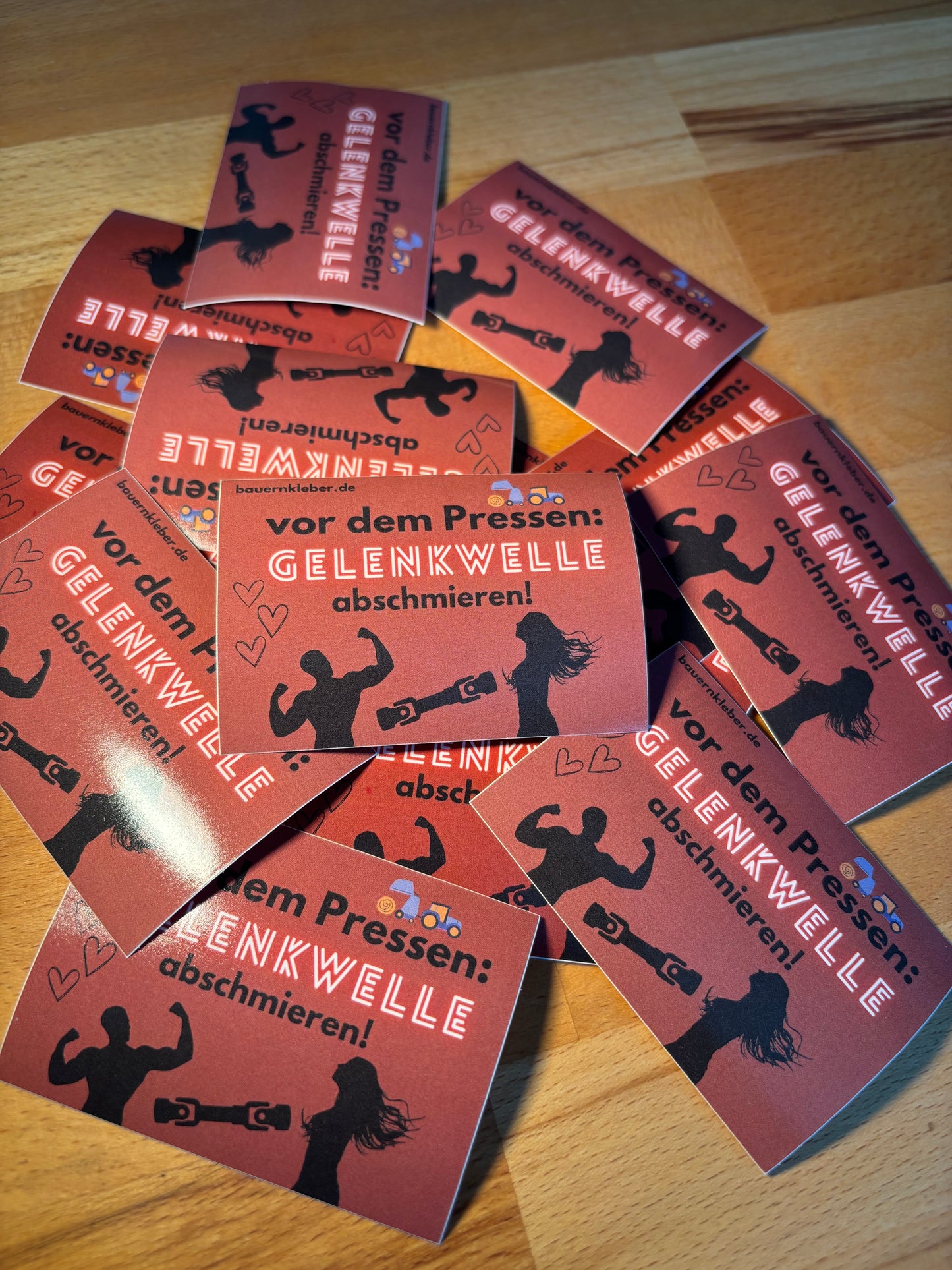Sticker " Vor dem Pressen Gelenkwelle abschmieren"